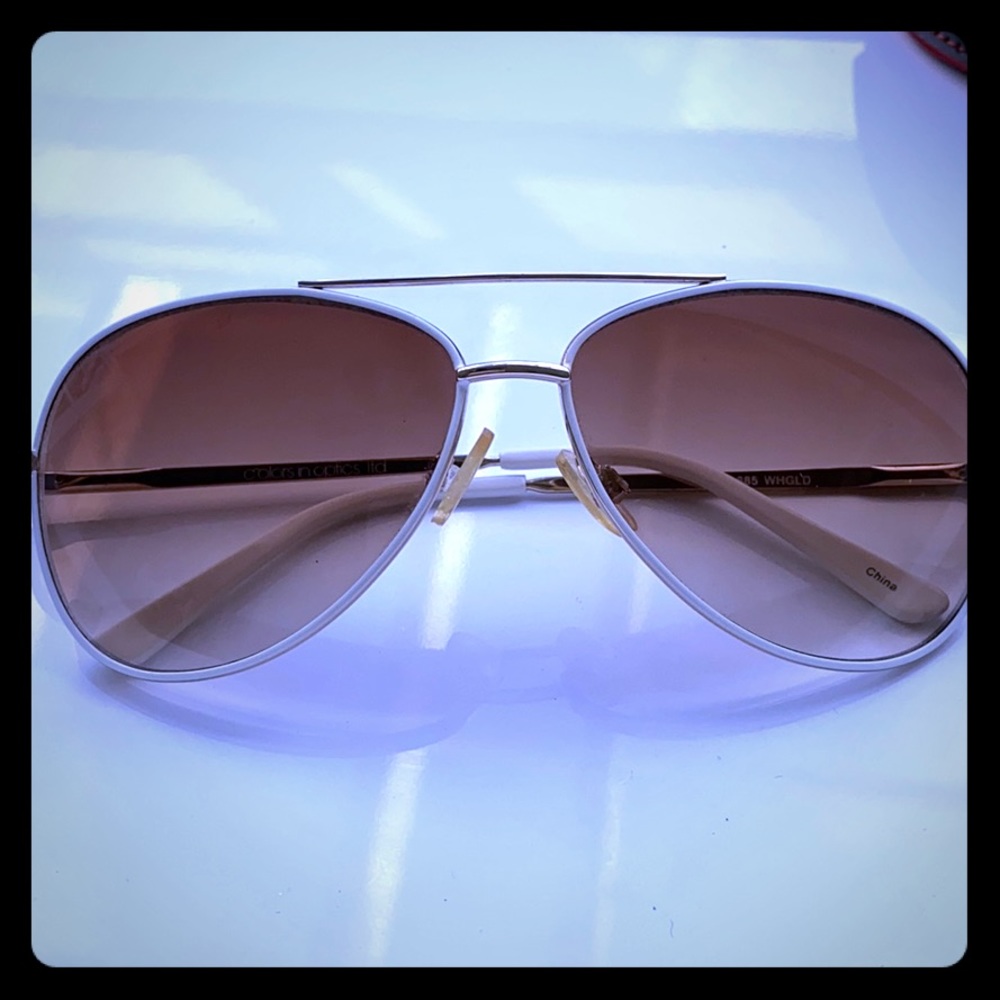 Andrea Jovine white and gold aviators
